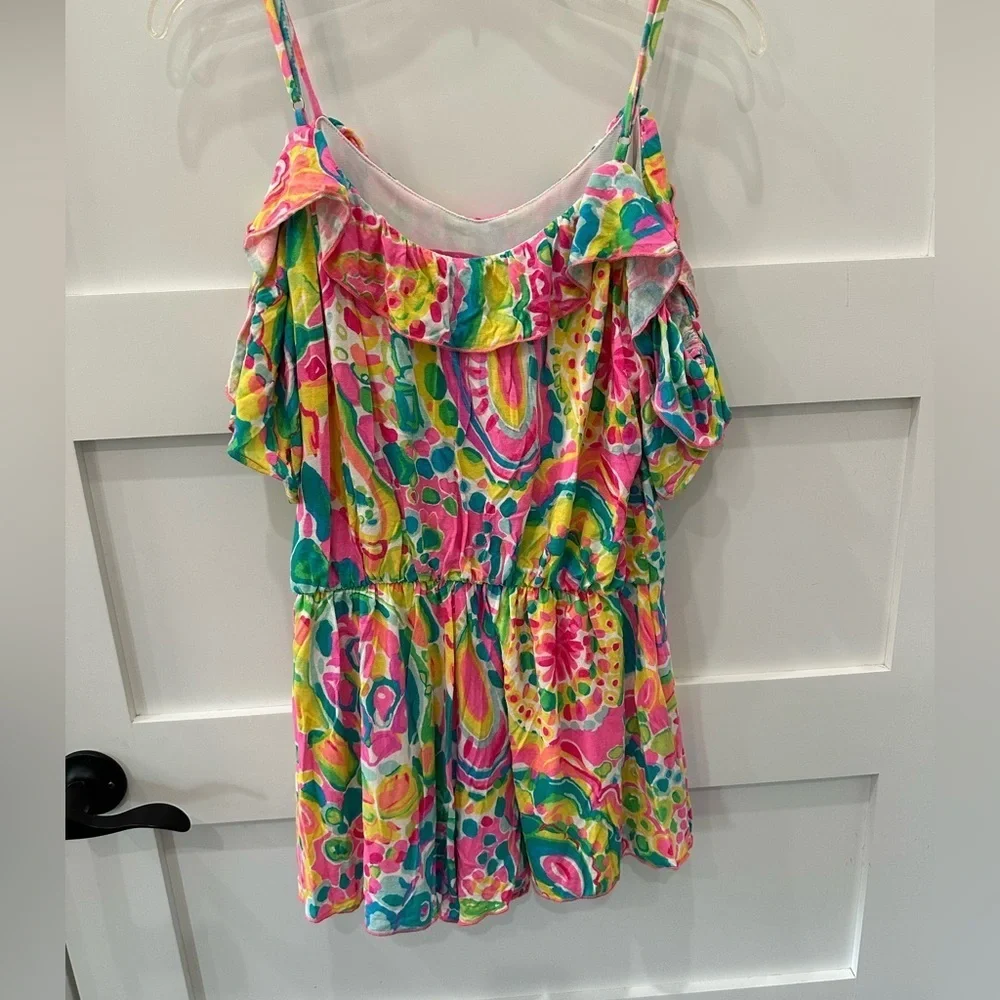Lilly Pulitzer Vibrant Pink and Green romper.